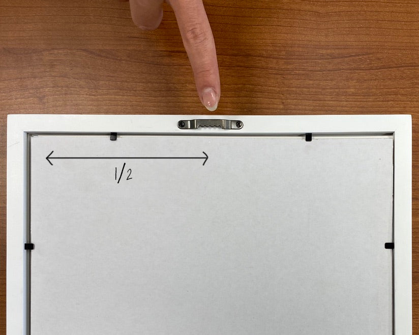 How to attach a sawtooth hook to a picture frame